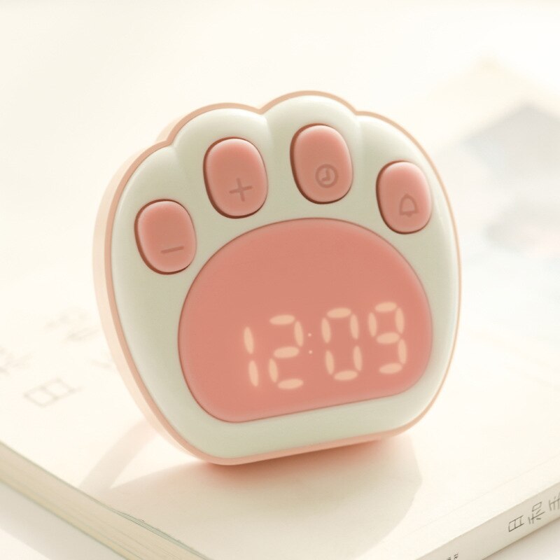 Lindo reloj despertador con forma de pata de gato